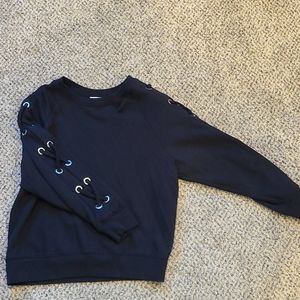 Black crew neck with criss-cross lace sleeves
